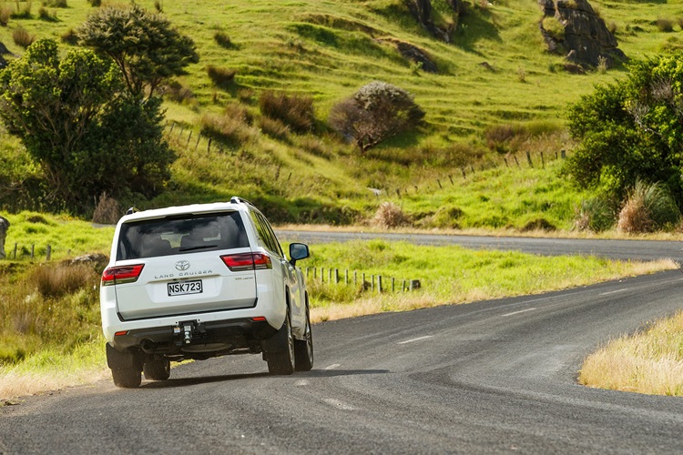 Back view of Toyota Landcruiser on road