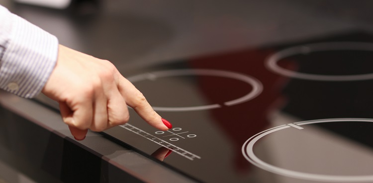 High-tech induction countertop in the kitchen